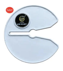 WHITE plastic tool with a GRIP DRY WITH MAGNETIC GOLF BALL MARKER on a white background