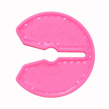 Pink plastic tool with 'Grip Dry' branding on a white background
