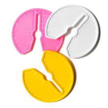GRIP DRY IN PINK WHITE AND YELLOW ON WHITE BACKGROUND