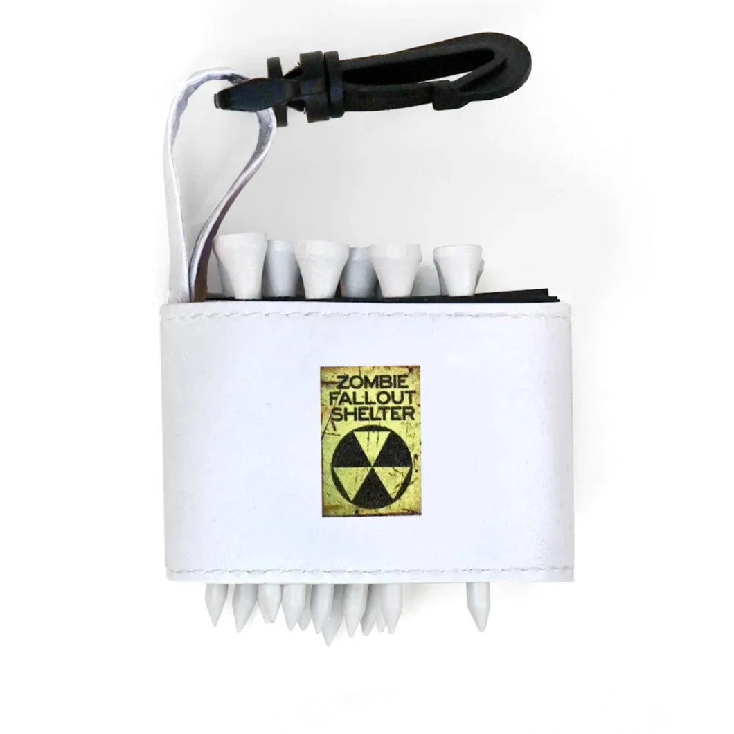 Golf tee holder with 'ZOMBIE FALLOUT SHELTER' text on a white background 