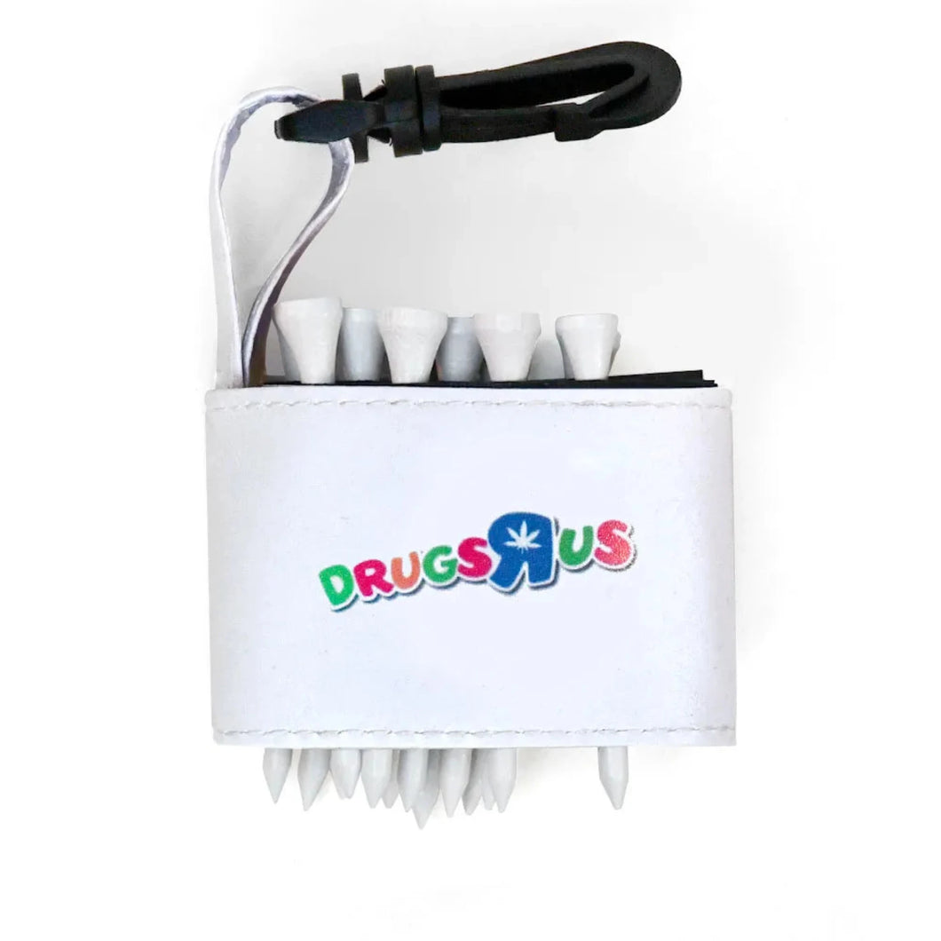 Golf tee holder with 'DRUGS ARE US' text on a white background 