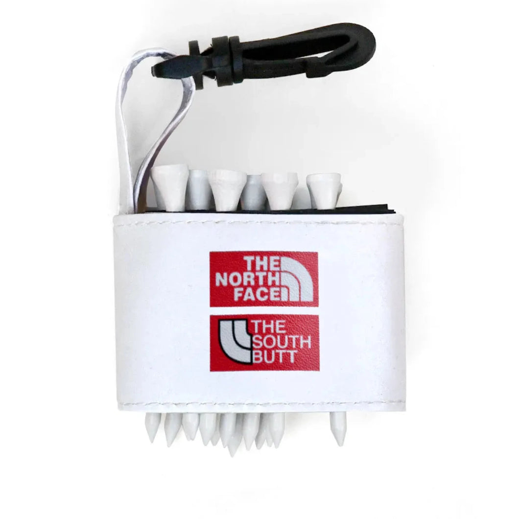 Golf tee holder with 'THE NORTH FACE AND SOUTH BUTT' text on a white background 