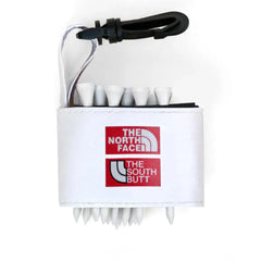 Golf tee holder with 'THE NORTH FACE AND SOUTH BUTT' text on a white background